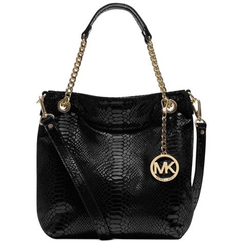 michael michael kors jet set medium chain leather tote bag|Michael Kors bag with airplanes.